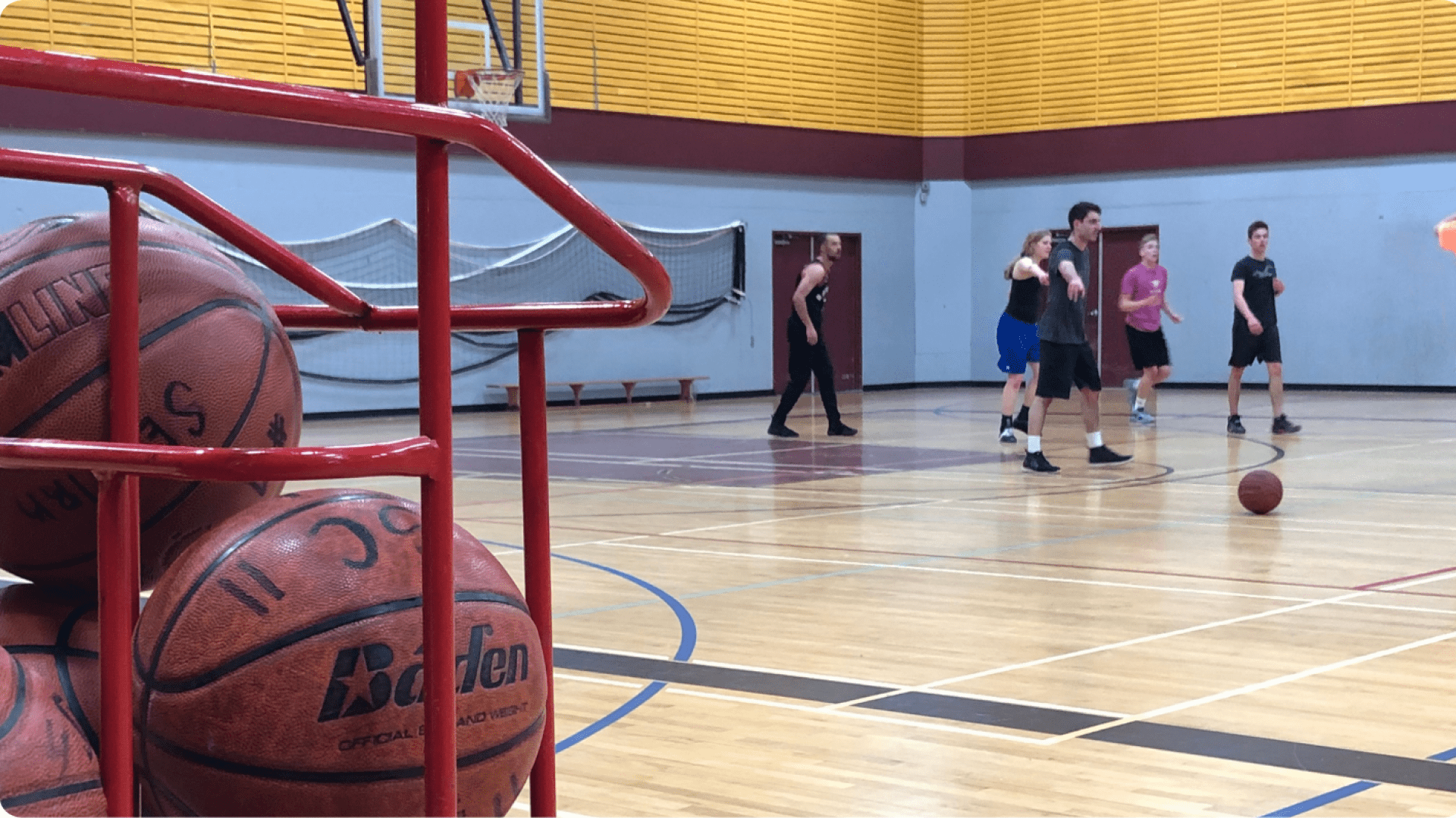 student playing basketball