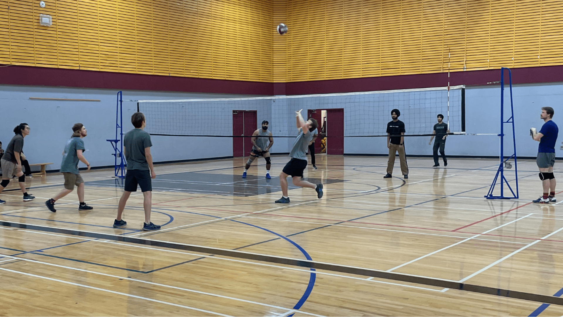 students playing volleyball