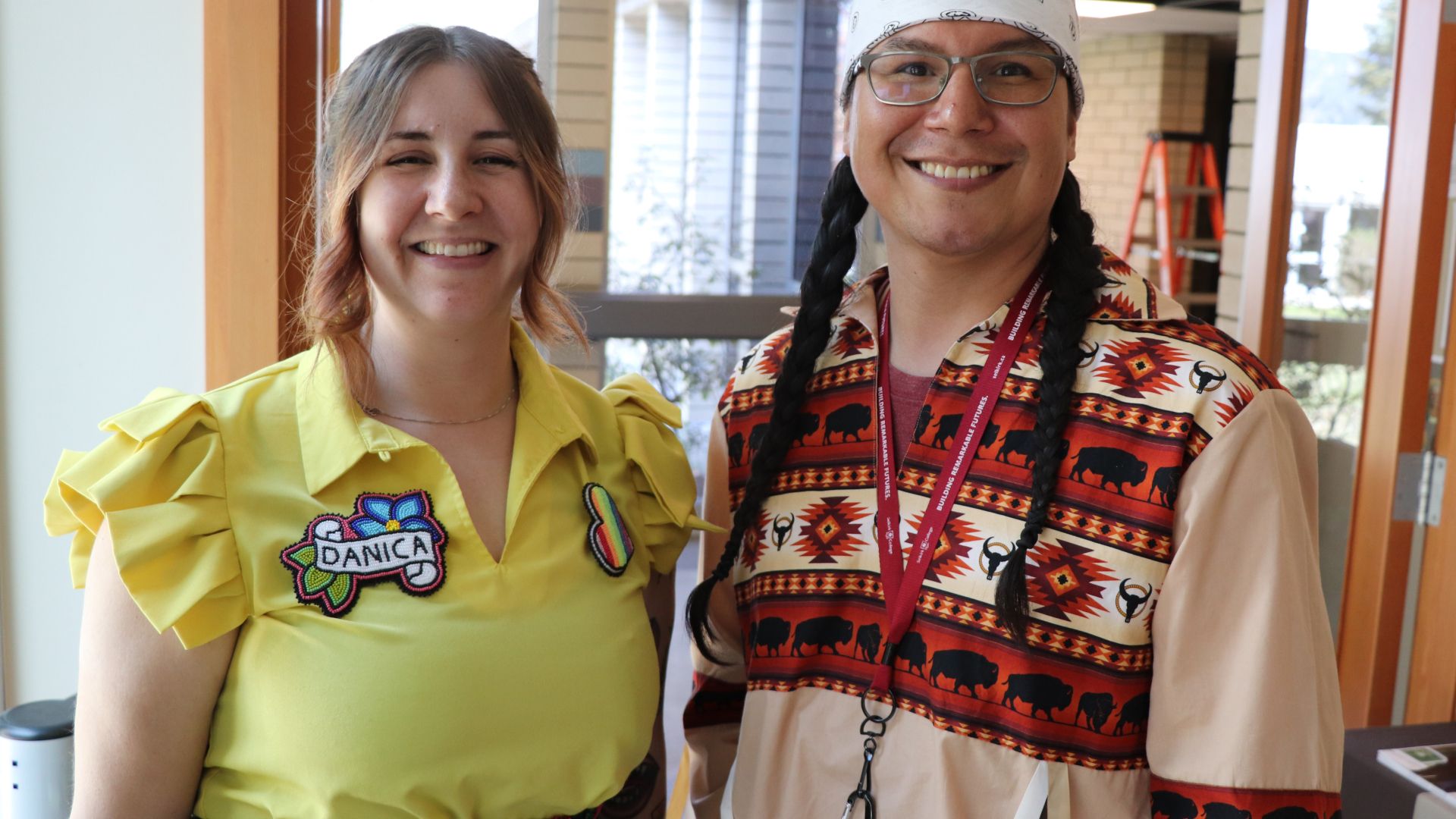 Danica and Rodney smiling and looking at the camera 