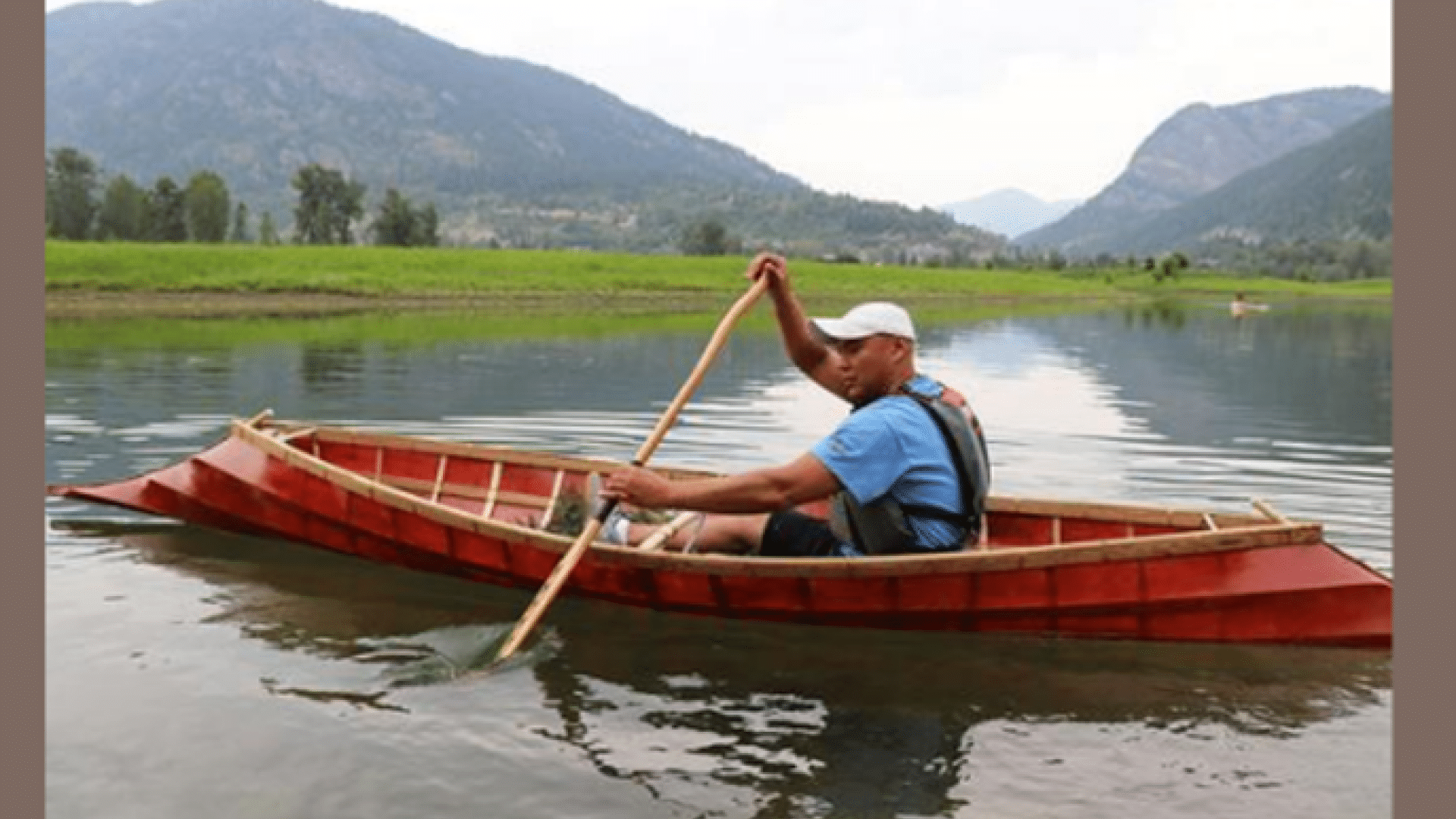 man on canoe