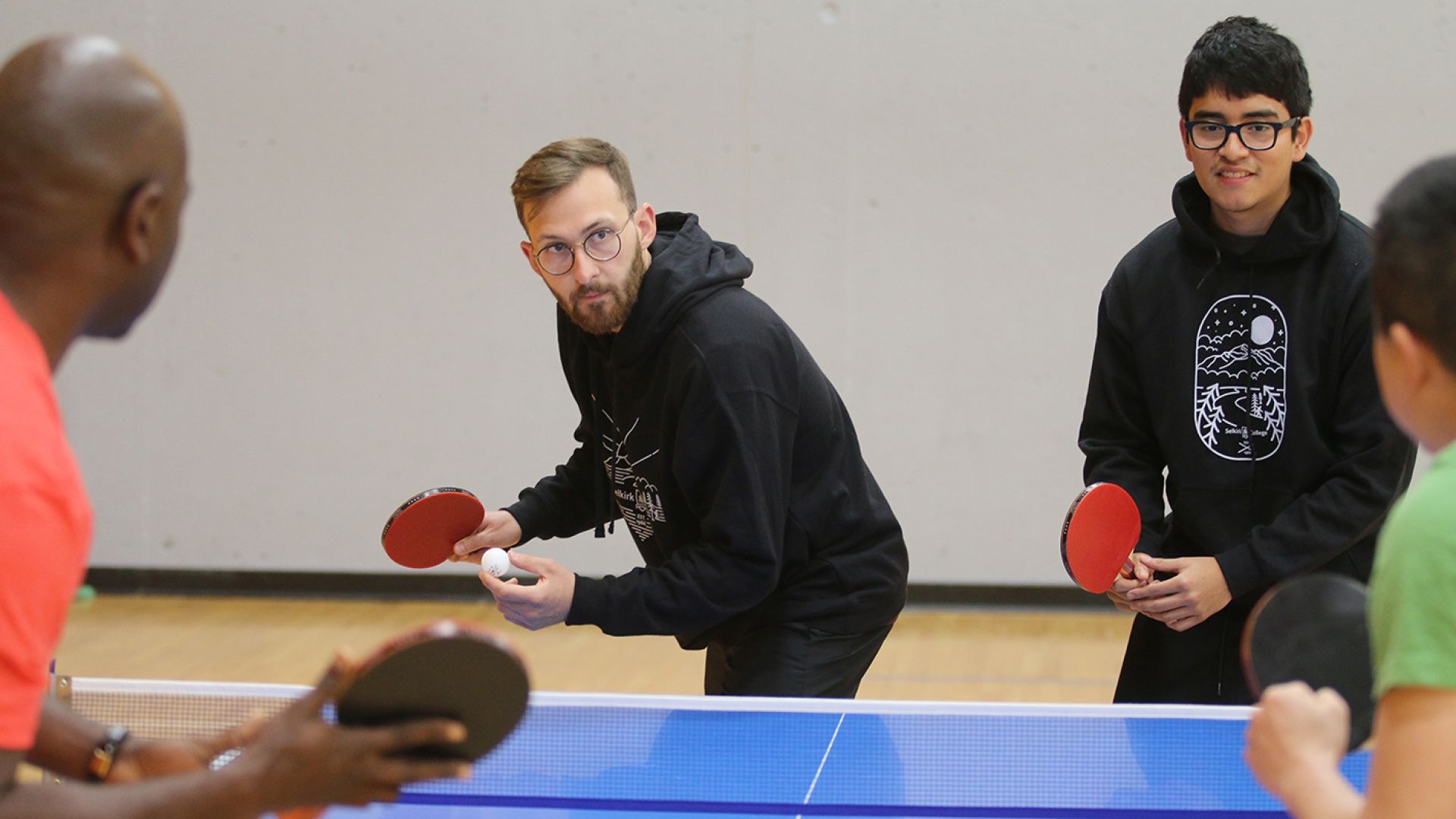 students playing table tennis