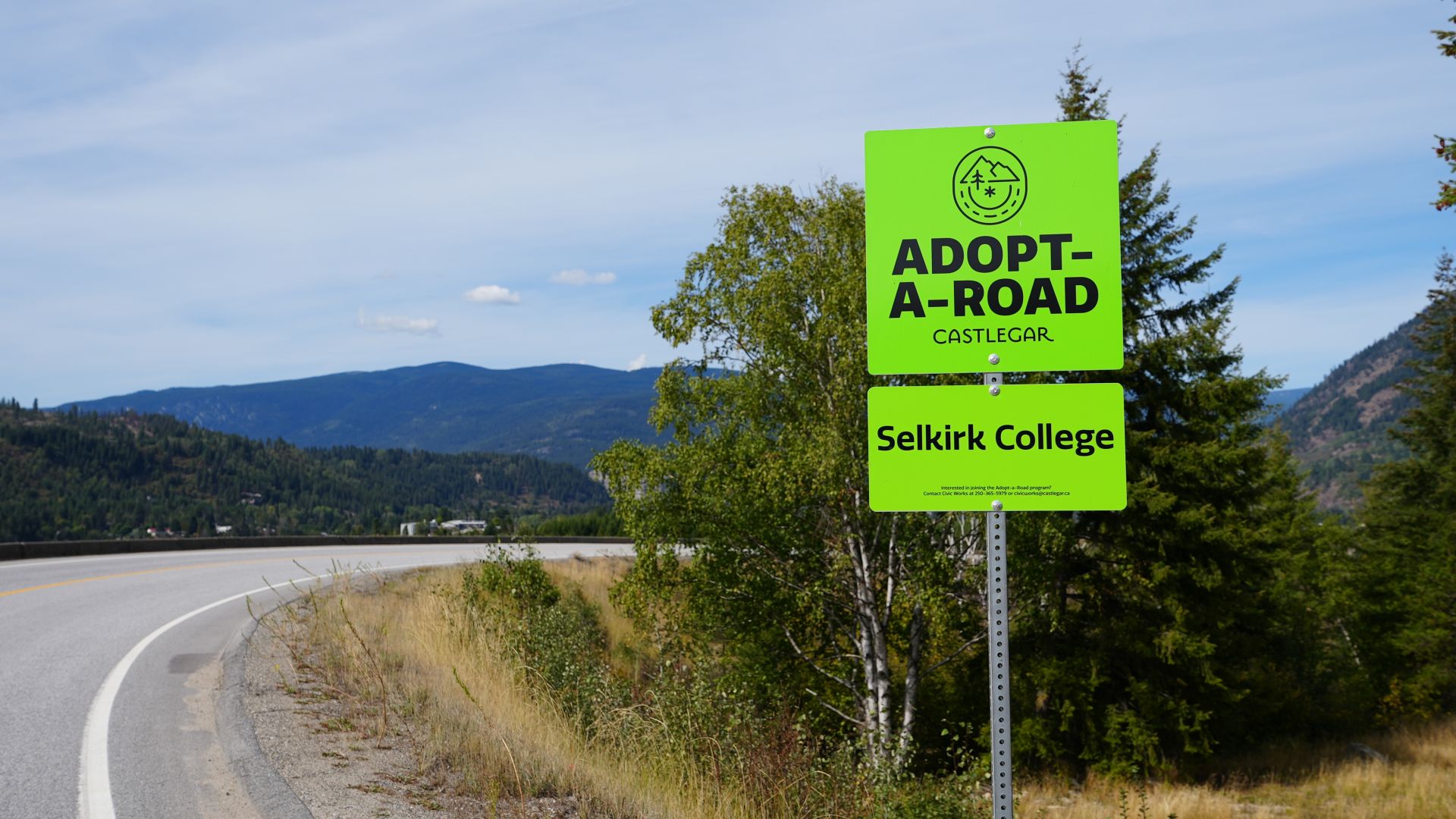 An Adopt a Road Sign