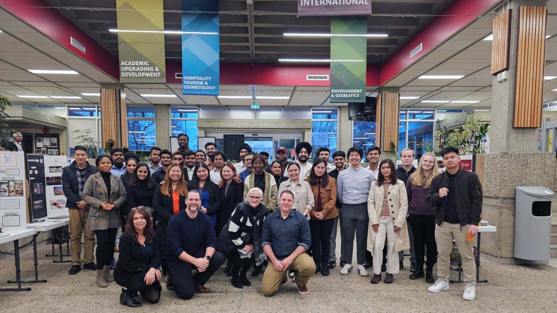 A group of business students and instructors