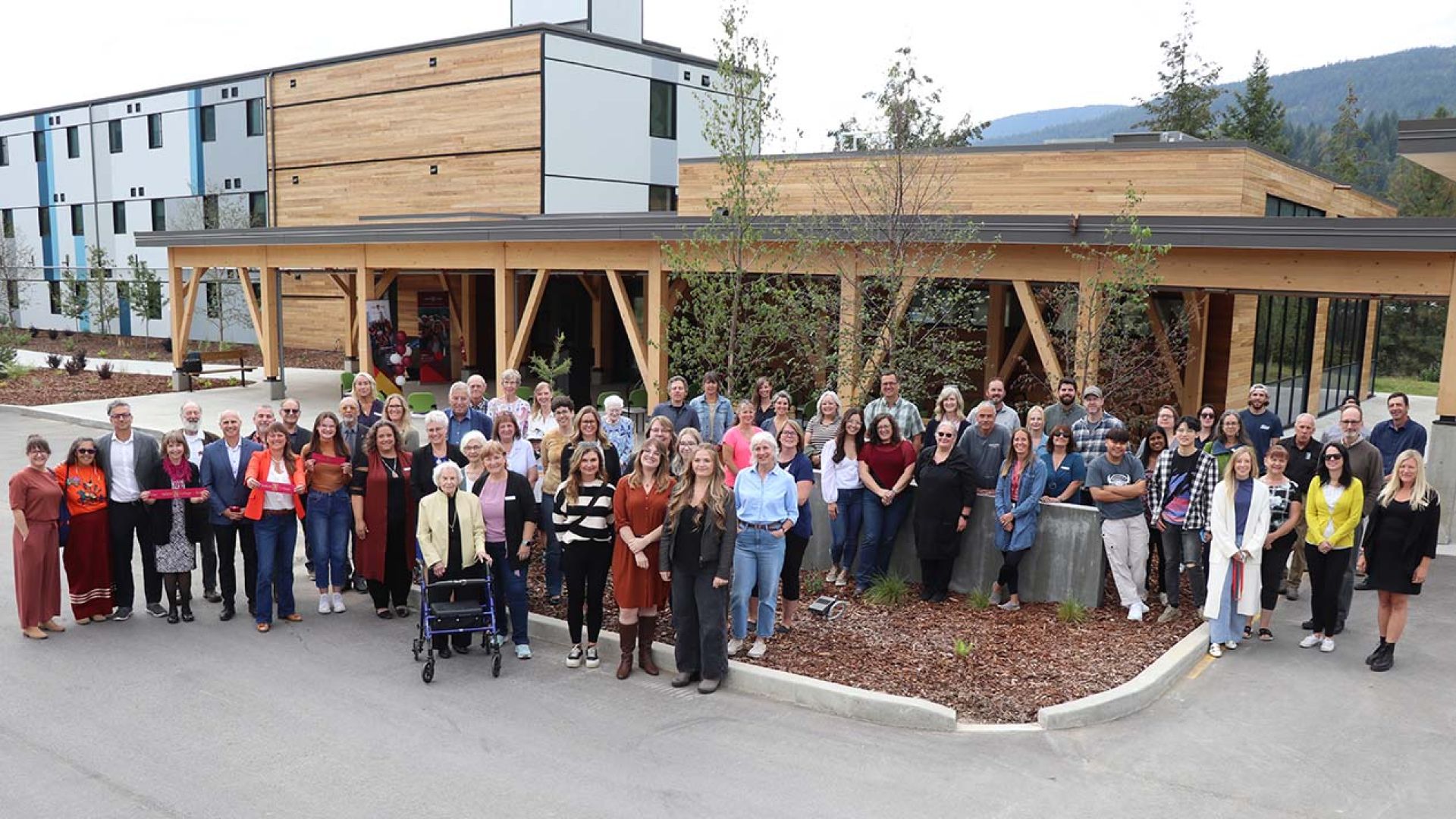 Big group that attended official opening of Castlegar Campus student housing gather for a photo