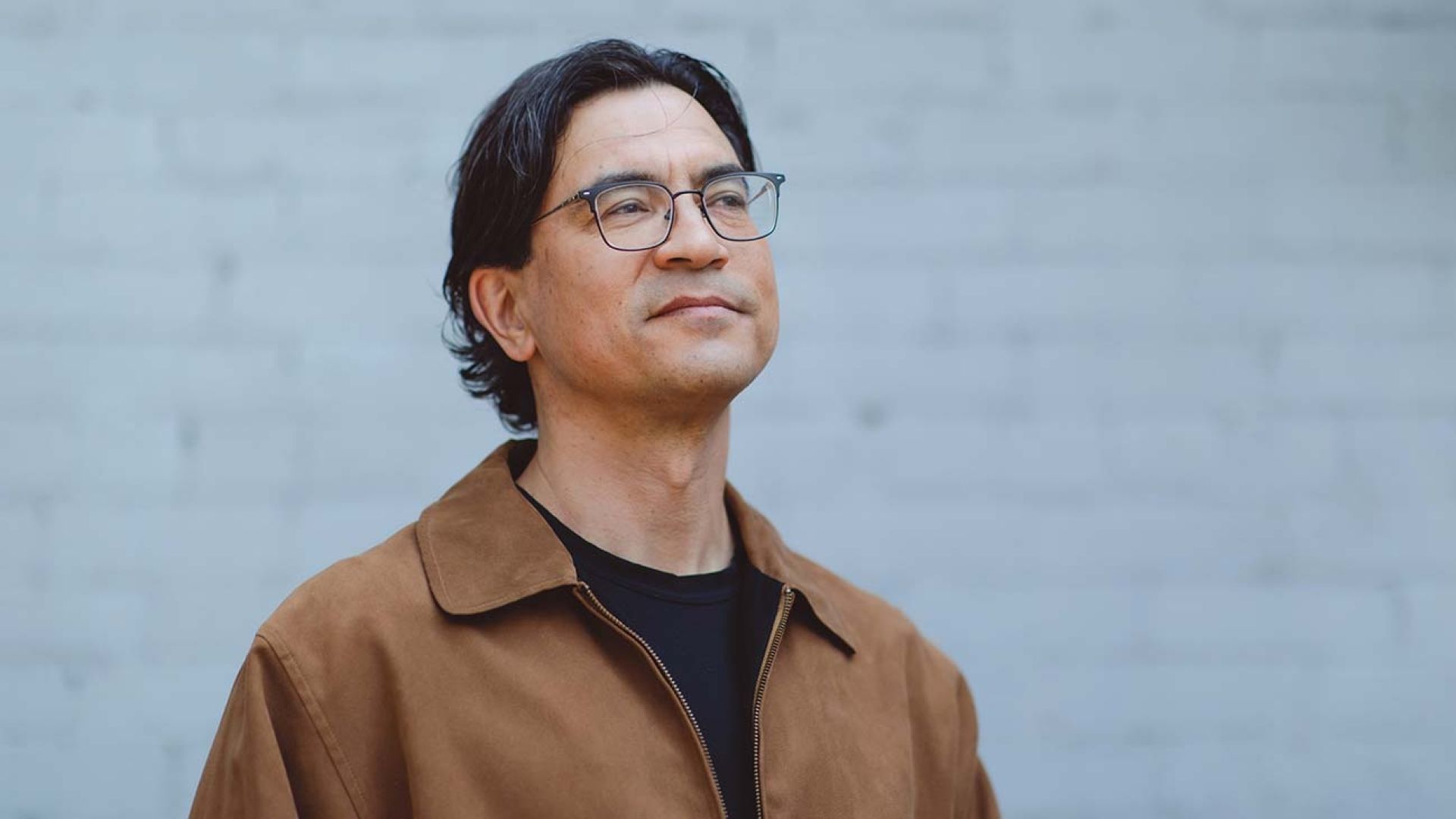 Duncan McCue stands outside