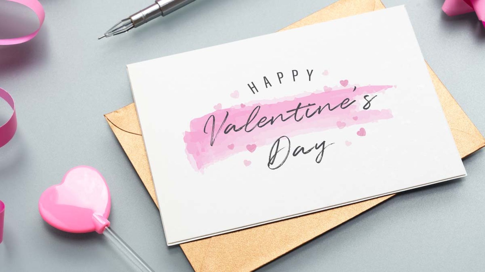 A Valentine's card and a gold envelope