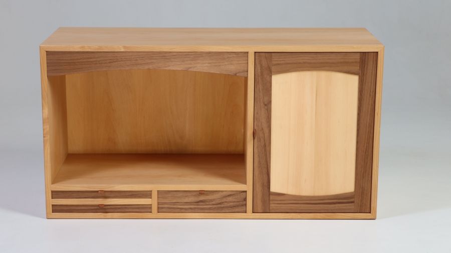 An image of a handmade wooden cabinet