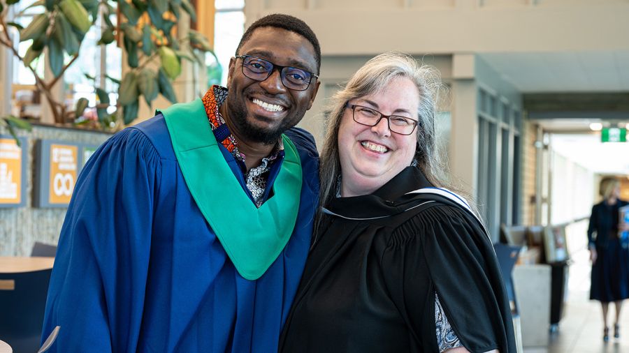 Student with Instructor at Convocation