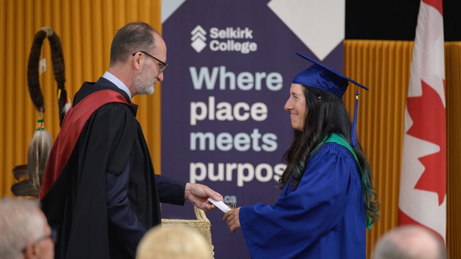 Student accepting award at Convocation