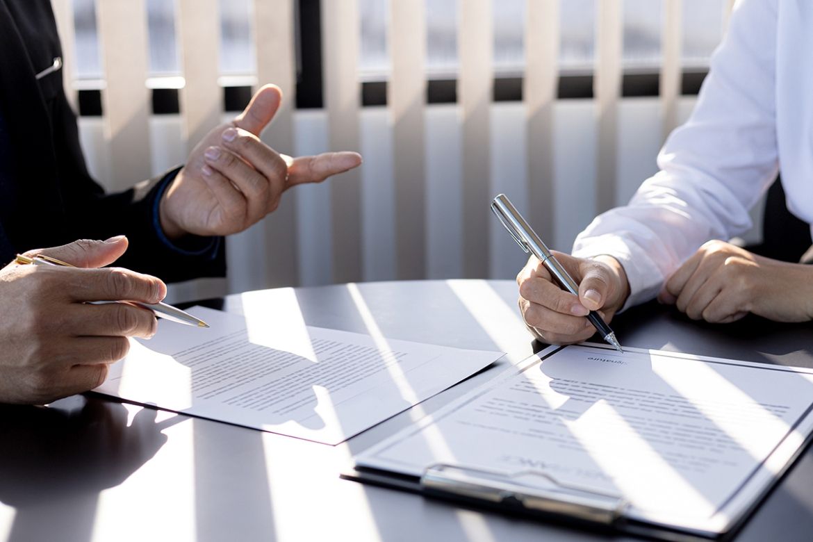 People in a meeting working on policies