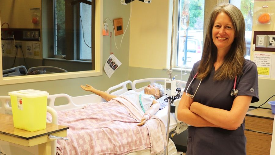 A nursing student smiling