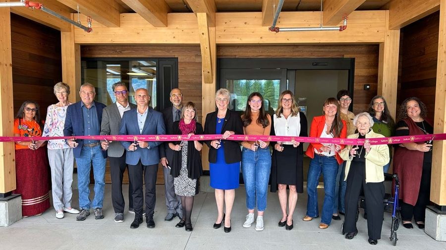 Selkirk College staff and students are joined by provincial politicians for ribbon cutting