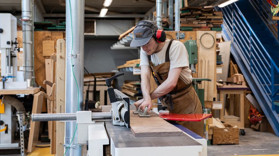 A Fine Woodworking students works on a project