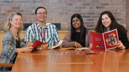 Members of EDI Committee discuss new action plan inside Castlegar Campus.