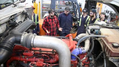 Summit visits heavy mechanics shop two