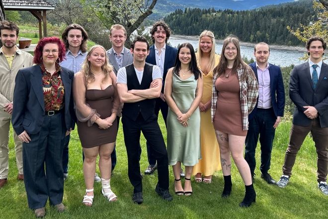 The 2024 cohort of Rural Pre Medicine Program graduates by the banks of the Columbia River