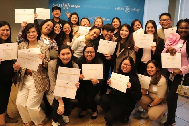 Group of Business Students very happy with awards