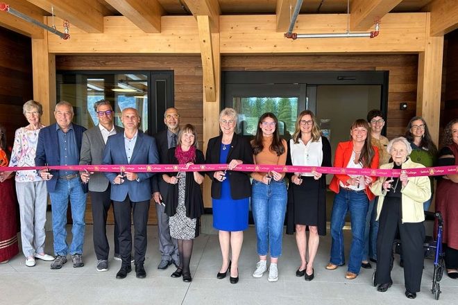 Selkirk College staff and students are joined by provincial politicians for ribbon cutting