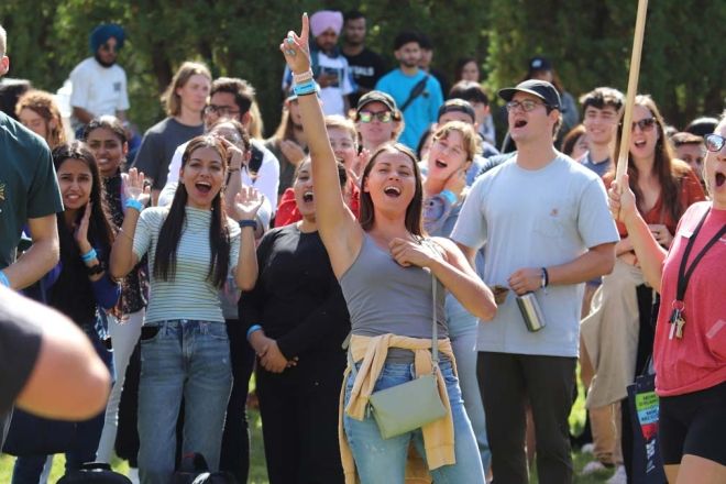 A group of students cheer at Get Connected