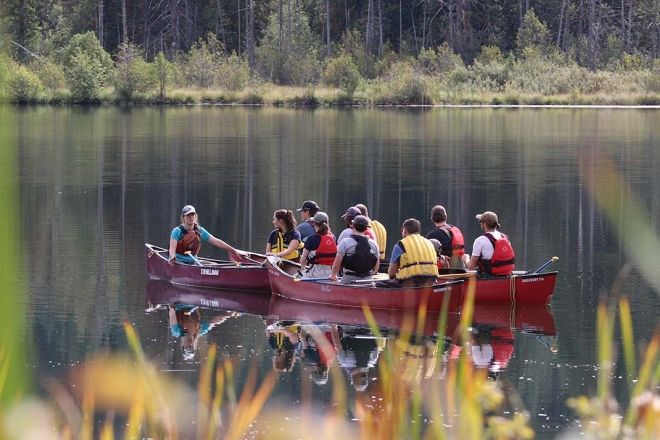 Photo of students learning on Erie Lake that is the cover image for the strategic plan