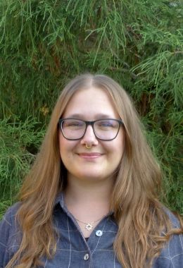 Leeza Perehudoff stands outside smiling