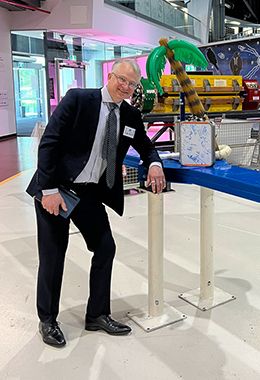 Morgan Dehnel smiles at a conference